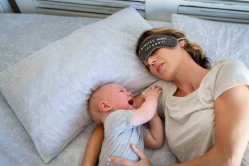 baby crying while mother sleeping 2021 08 27 18 49 23 utc 1 1