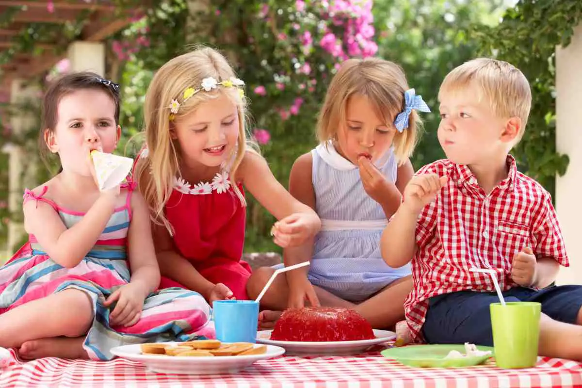 group of children eating jelly at outdoor tea part 2021 08 26 16 12 47 utc 1