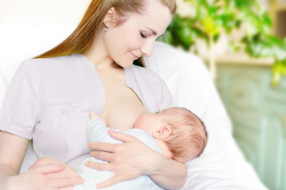mother breastfeeding her baby 2021 08 26 22 32 01 utc 1
